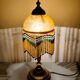 Gold table lamp with pendants