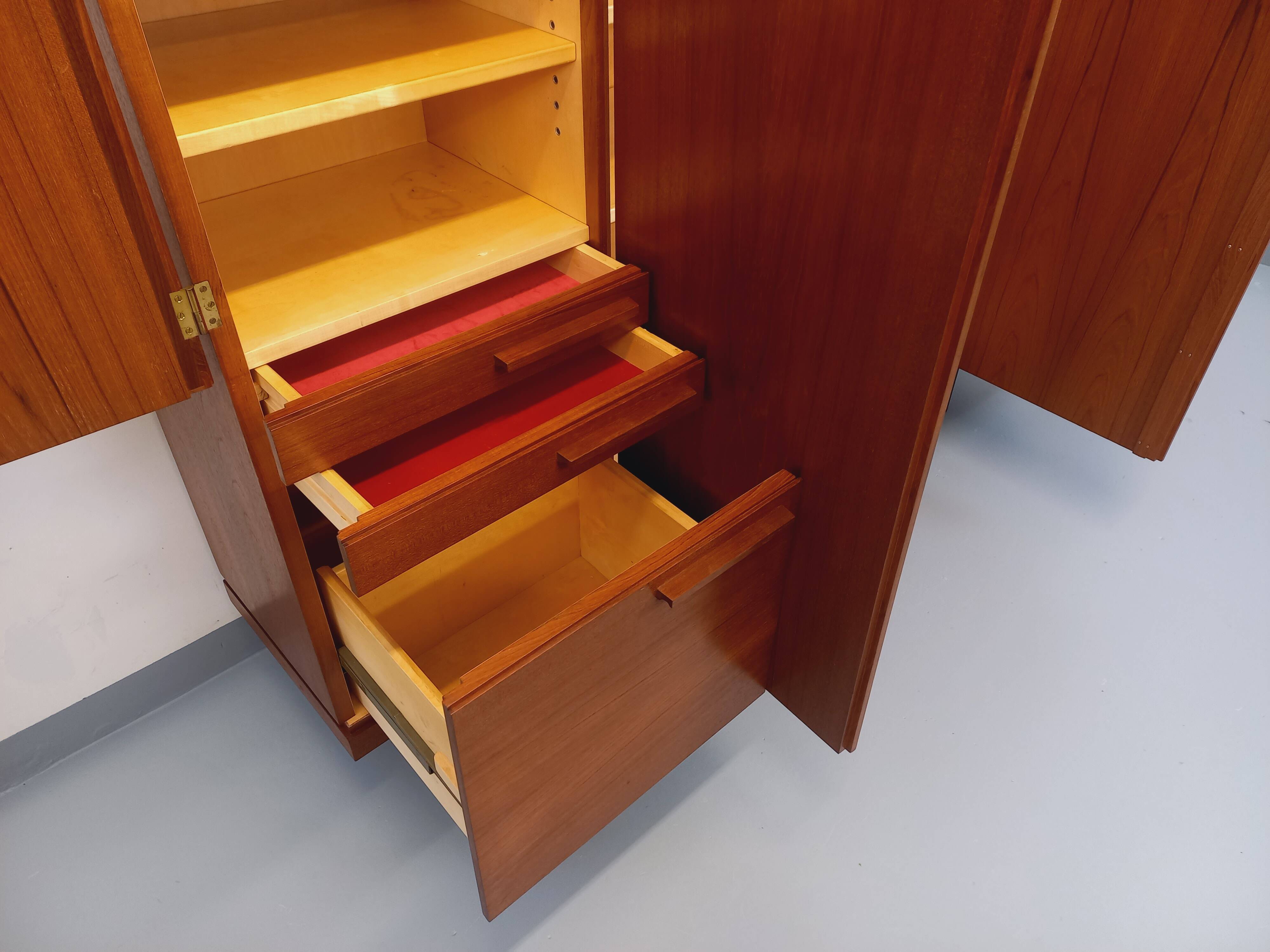 High Scandinavian modernist vintage sideboard in teak and black metal.