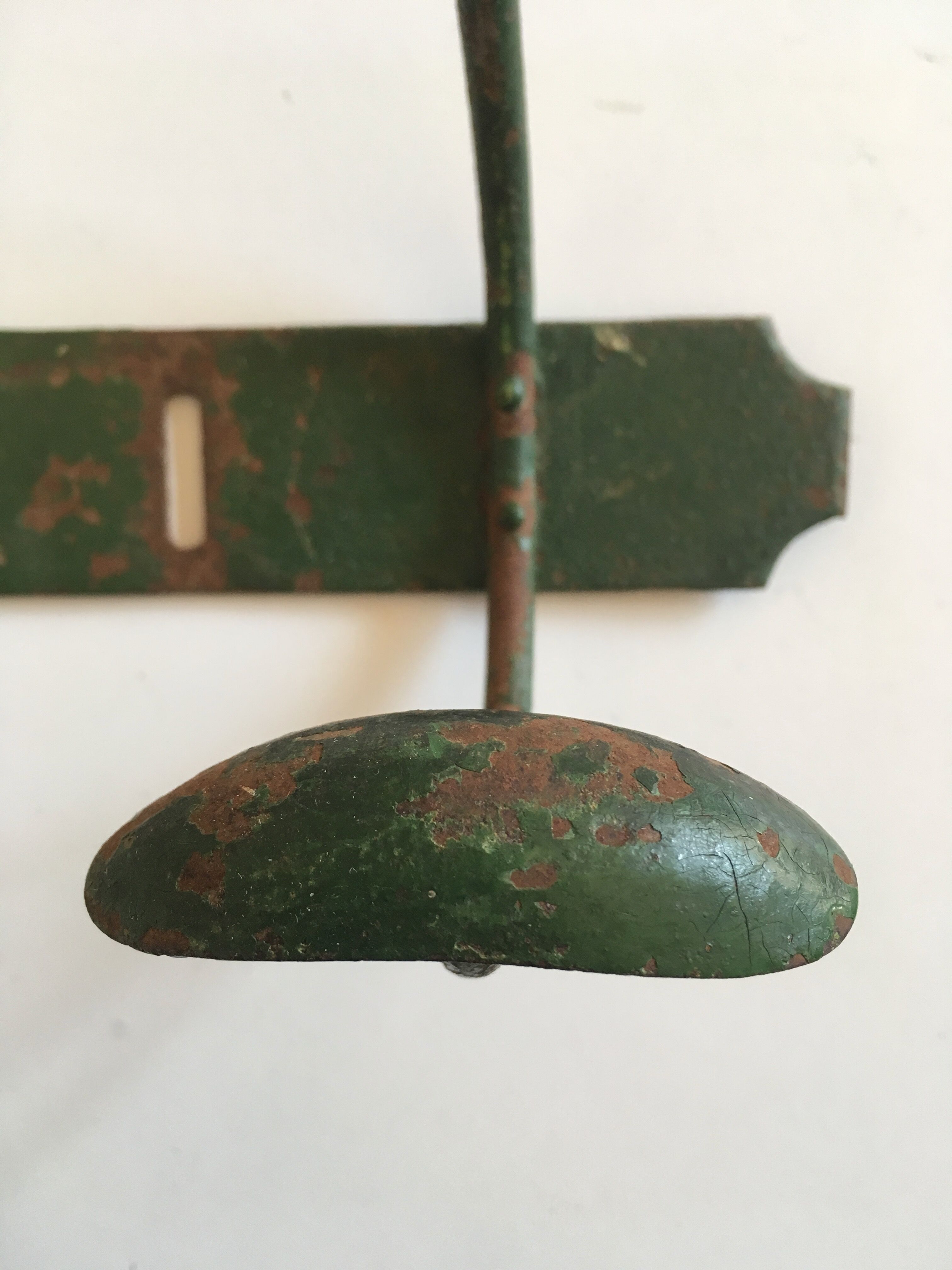 1900 green metal garden coat holder