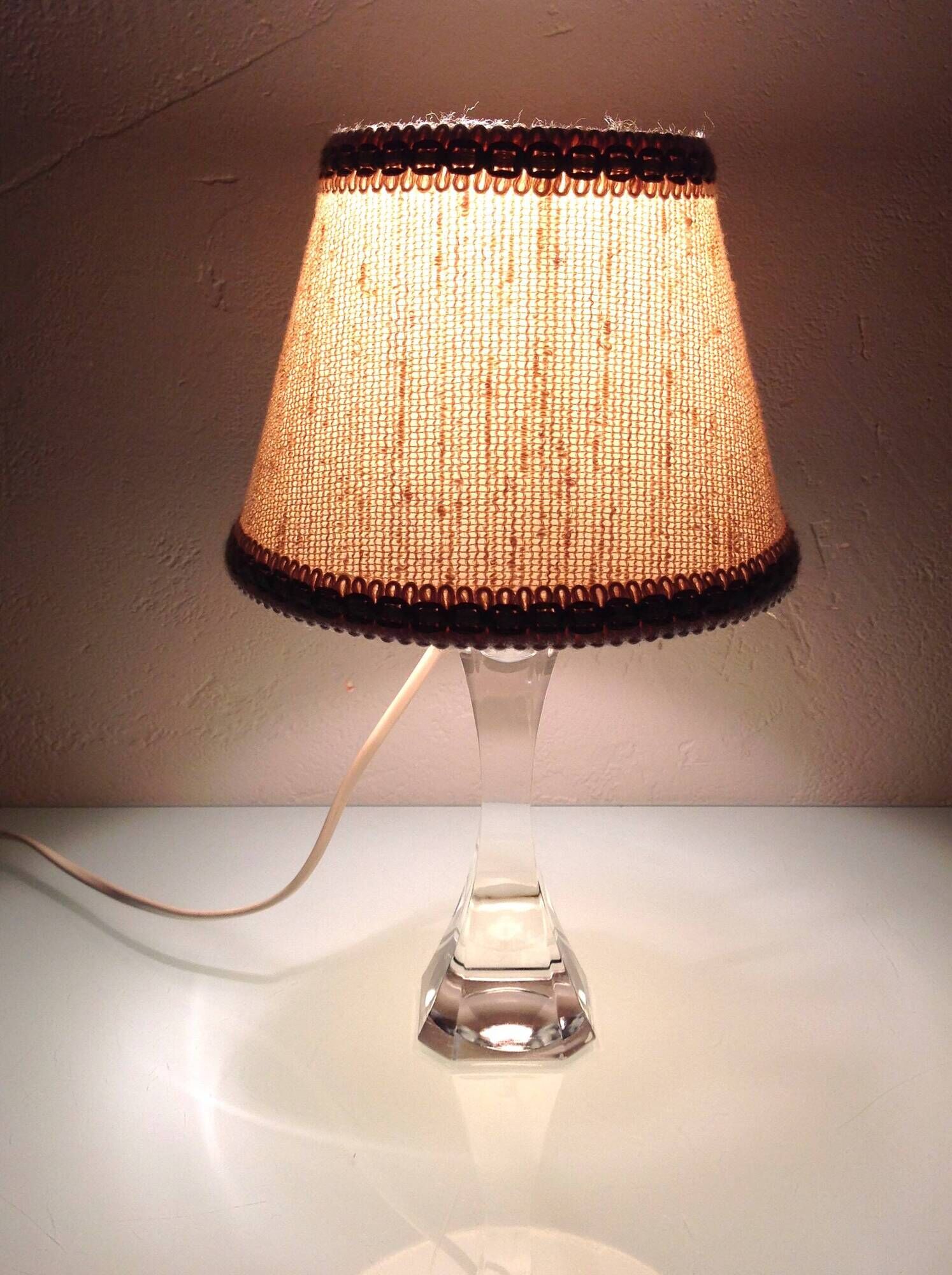 Bedside lamp with glass base and beige fabric lampshade / vintage 60s-70s