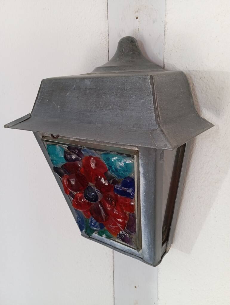 Zinc and colored glass wall light