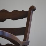 A pair of modern and sculptural vintage Danish armchairs in oak and papercord, 1940s.