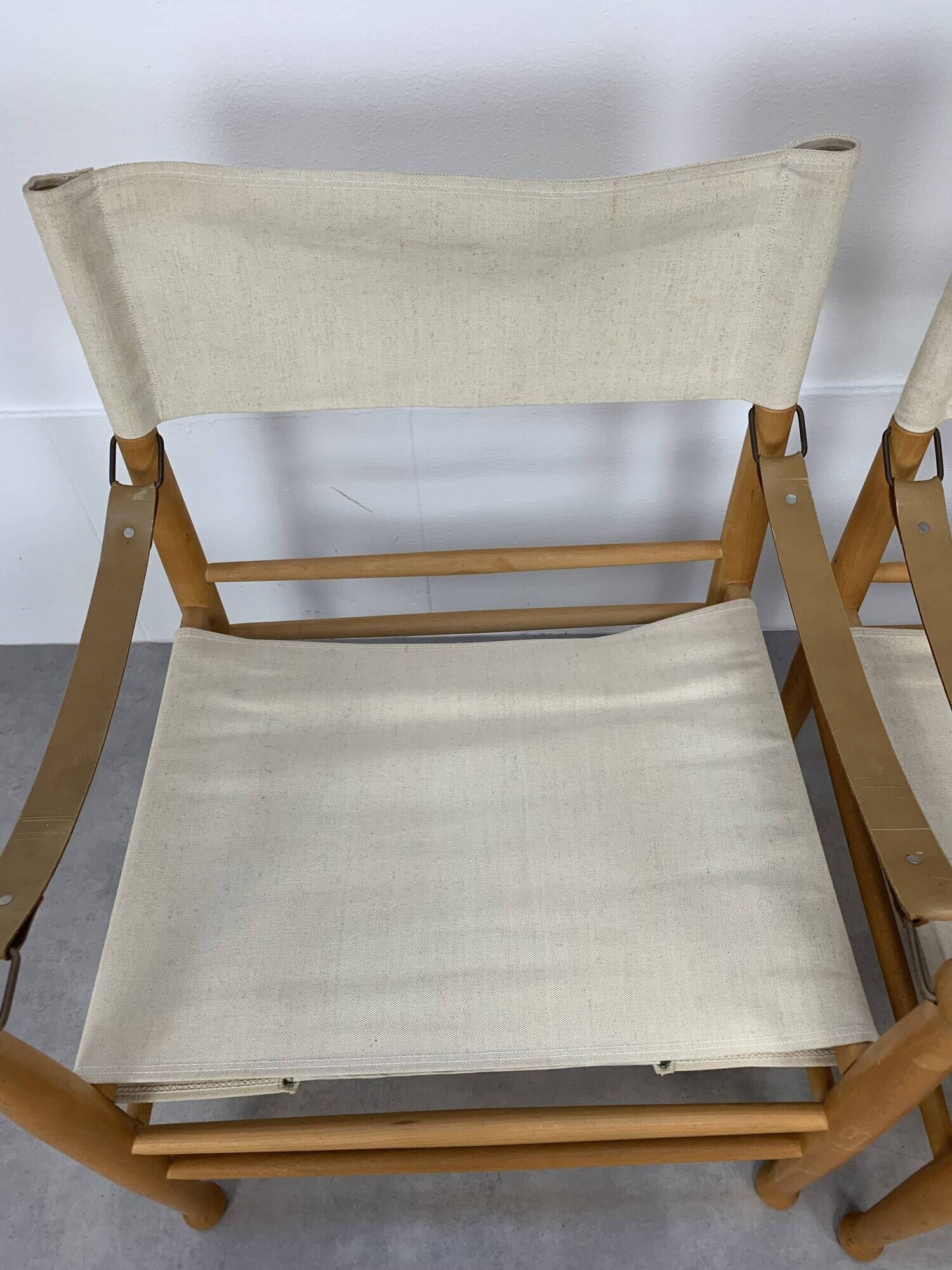 Pair of safari armchairs canvas and leather stretched
