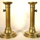 Pair of brass push candlesticks