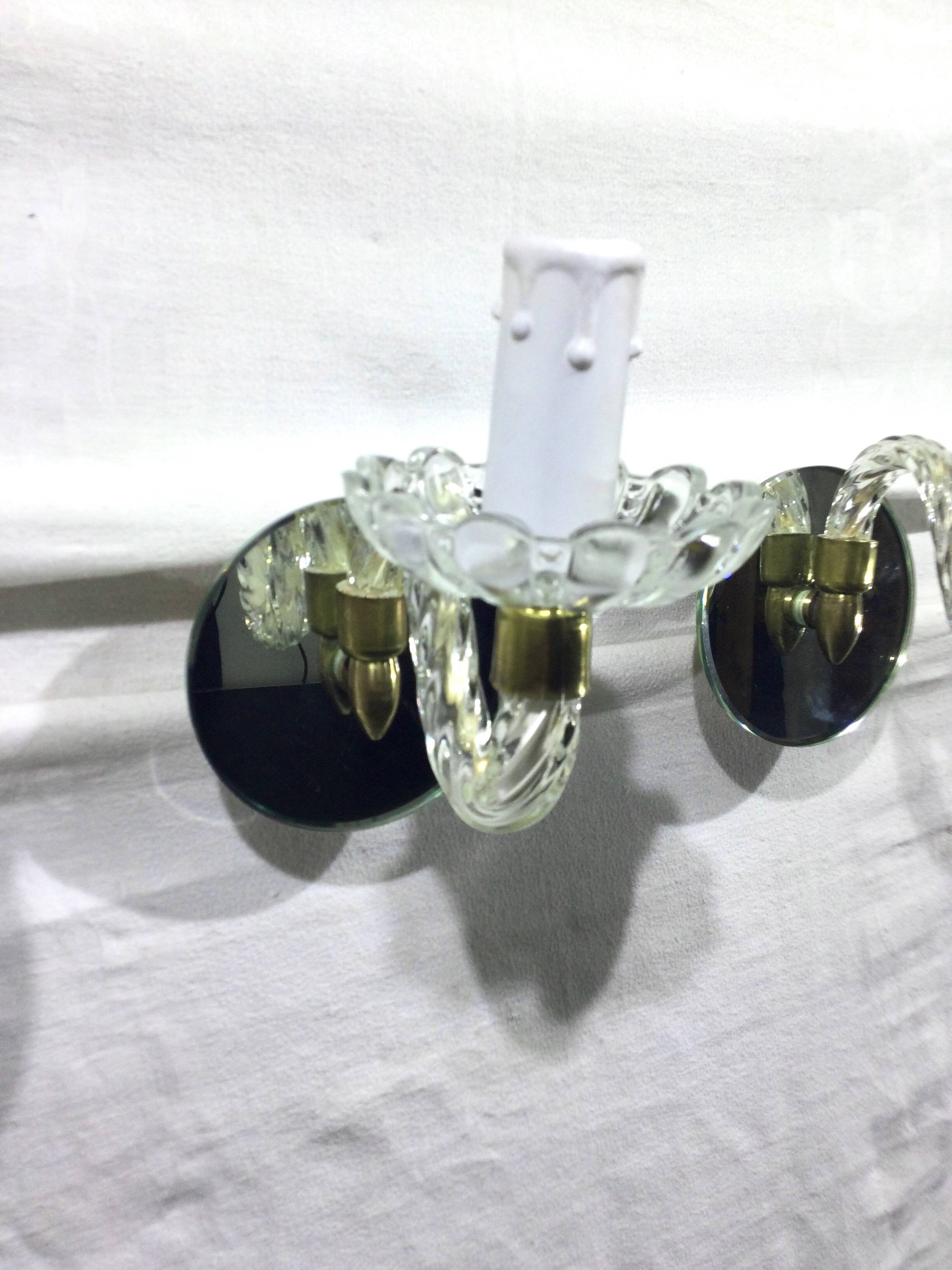 Pair of glass and mirror sconces