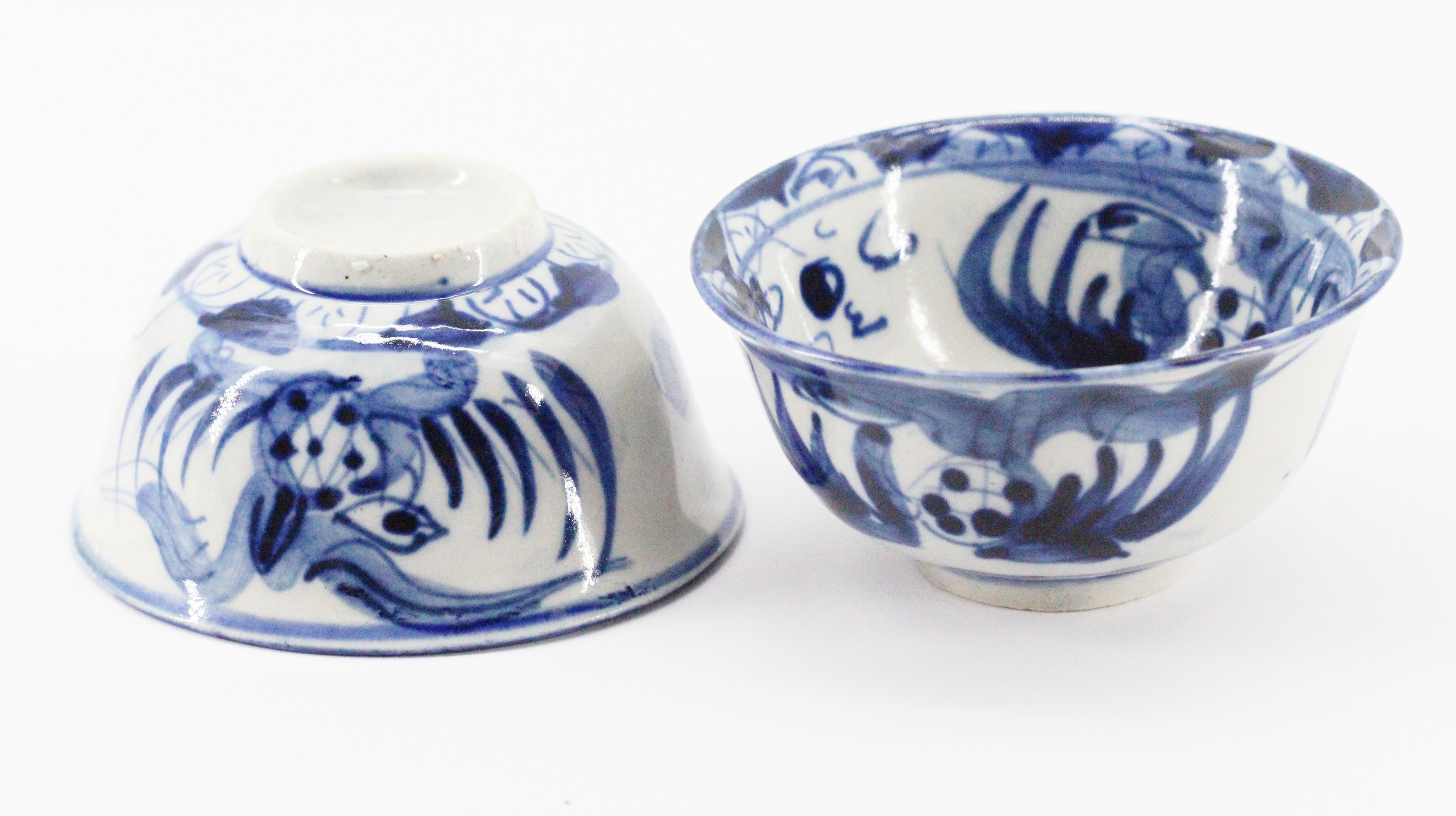 2 blue ceramic bowls