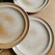 service of 7 vintage plates in Marais sandstone