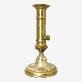 Brass candle holder with push button
