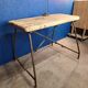 Vintage workbench circa 1930, folding metal leg.