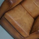 Paire de fauteuils club vintage en cuir cognac français, lot de 2