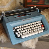 Blue typewriter Ollivetti Studiu 46 years 70