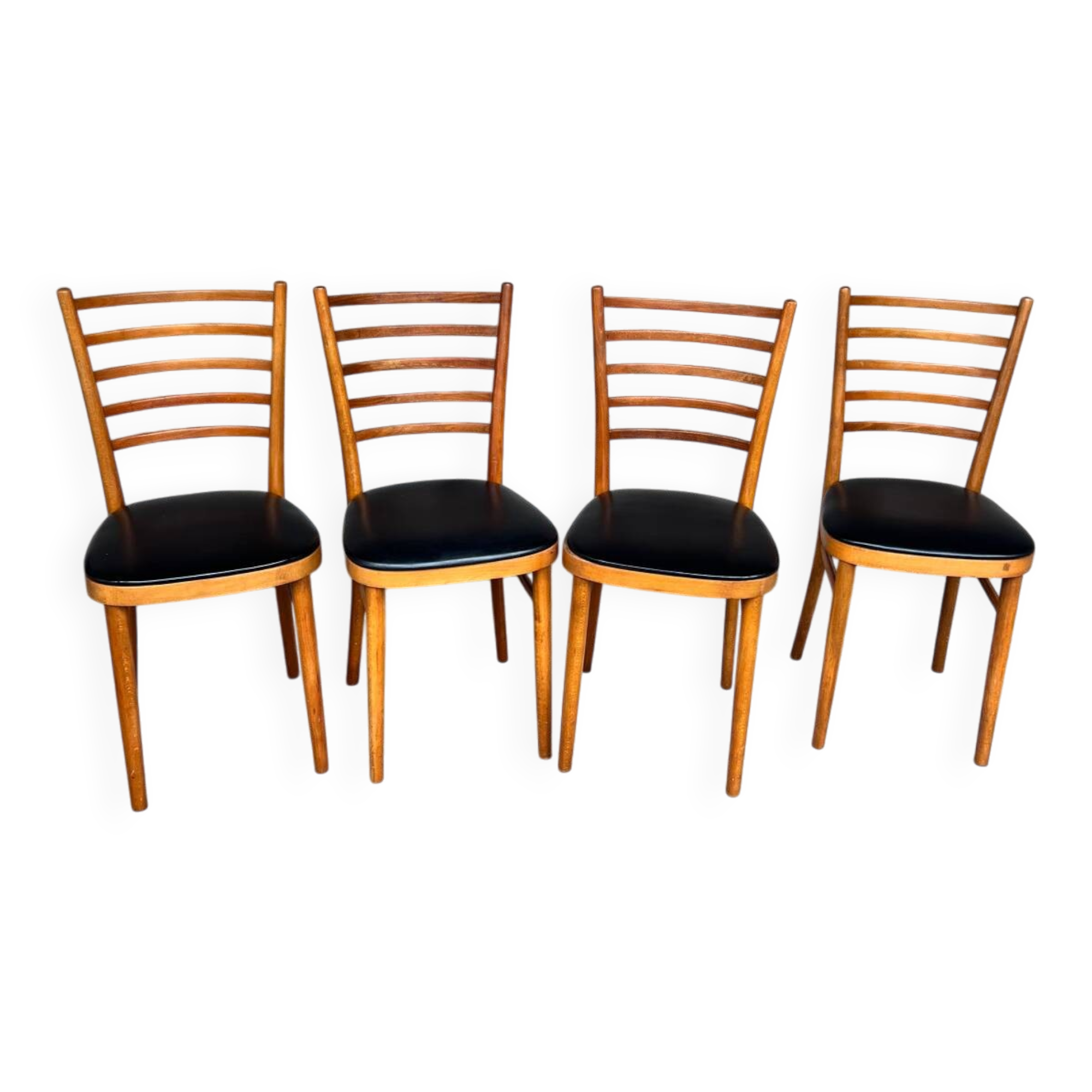 Set of 4 vintage wooden chairs with faux leather.