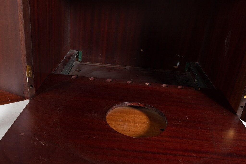 Vintage bar cabinet with brass markings
