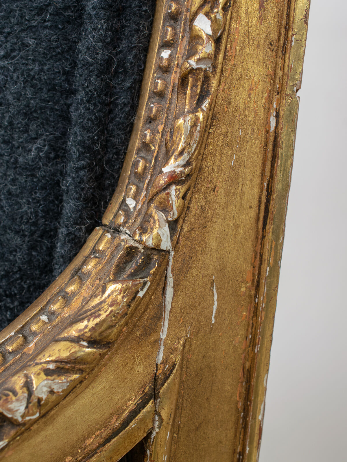 Pair of 19th century Louis XVI gilt armchairs newly re upholstered in holland and sherry fabric