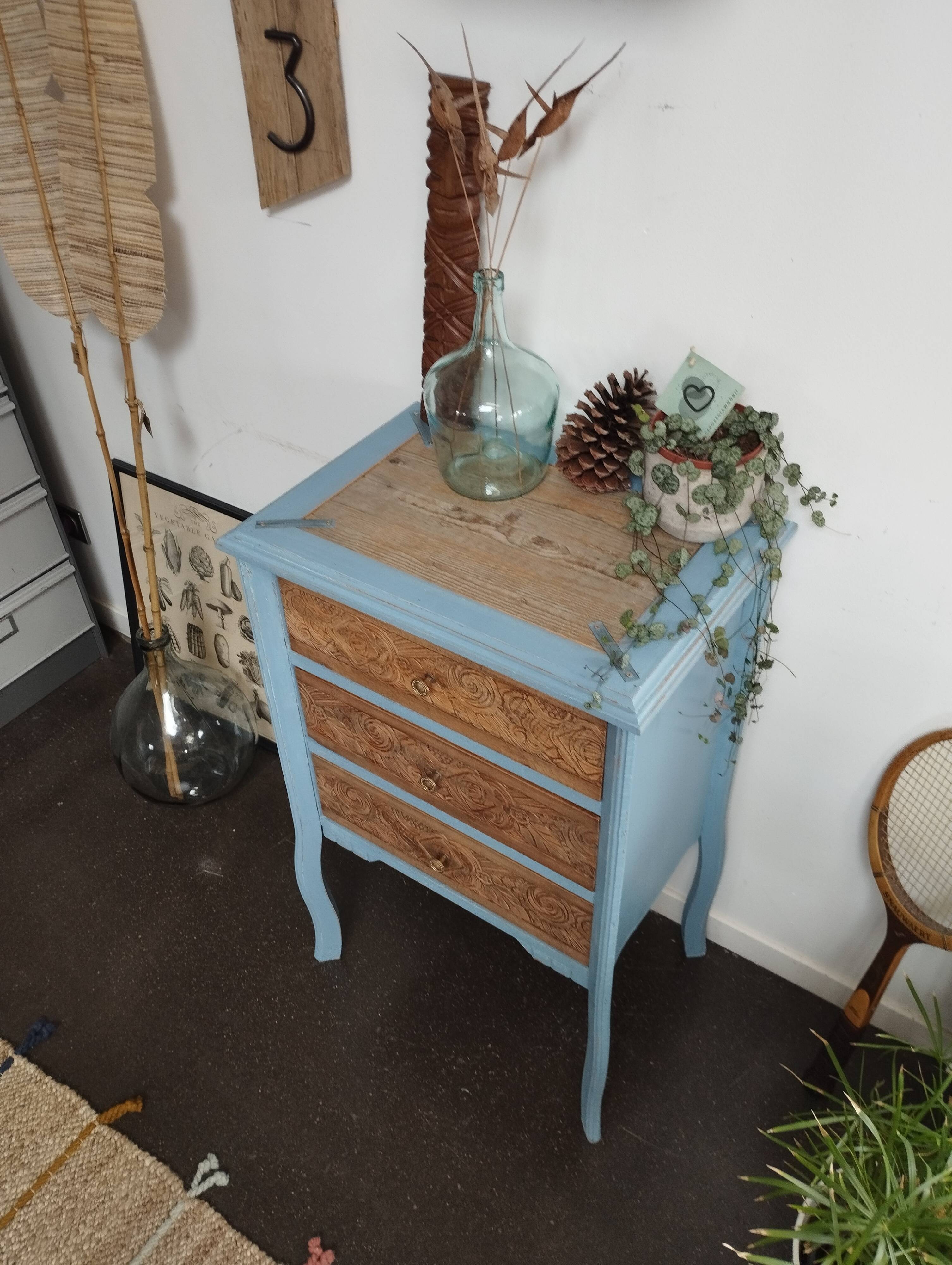 Small carved wood chest of drawers