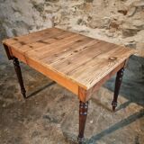 Vintage French pine table with extendable side, circa 1930, suitable for kitchen or office use.