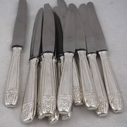 12 dessert, cheese, and hors d'oeuvre knives Grand Prix, Art Deco in silver-plated metal.
