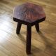 Tabouret tripode héxagonal