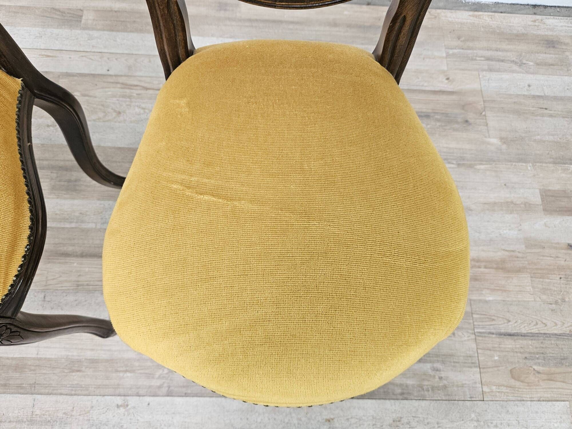Pair of early 1900s wooden chairs with padded seat and backrests