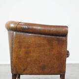 Club chair made of sheepskin leather with the most beautiful colors and a stunning patina