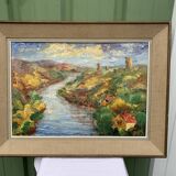 Colorful landscape painting with a river and hills signed Benjam