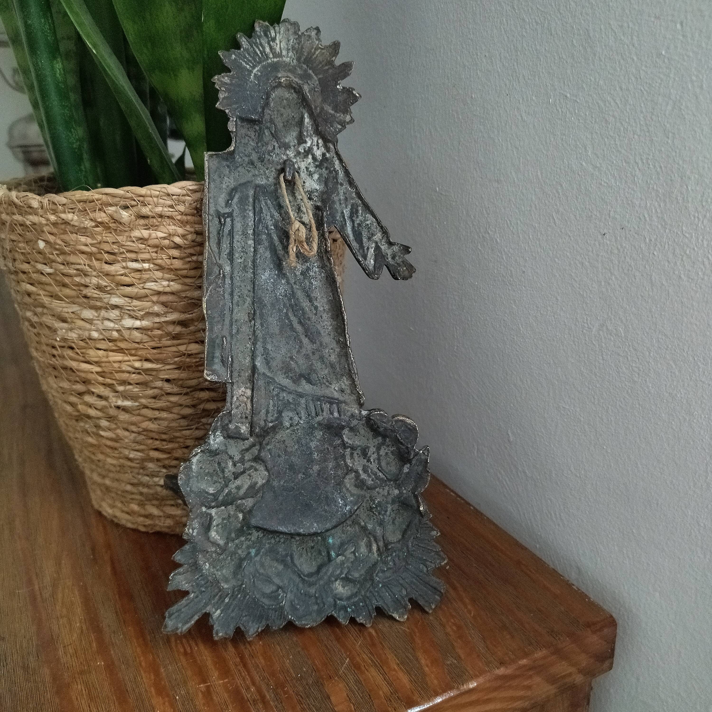Antique bronze holy water font