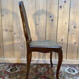 Set of 10 Louis XV style chairs in walnut and cane.