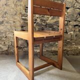 Suite de 4 chaises en pin par André Sornay