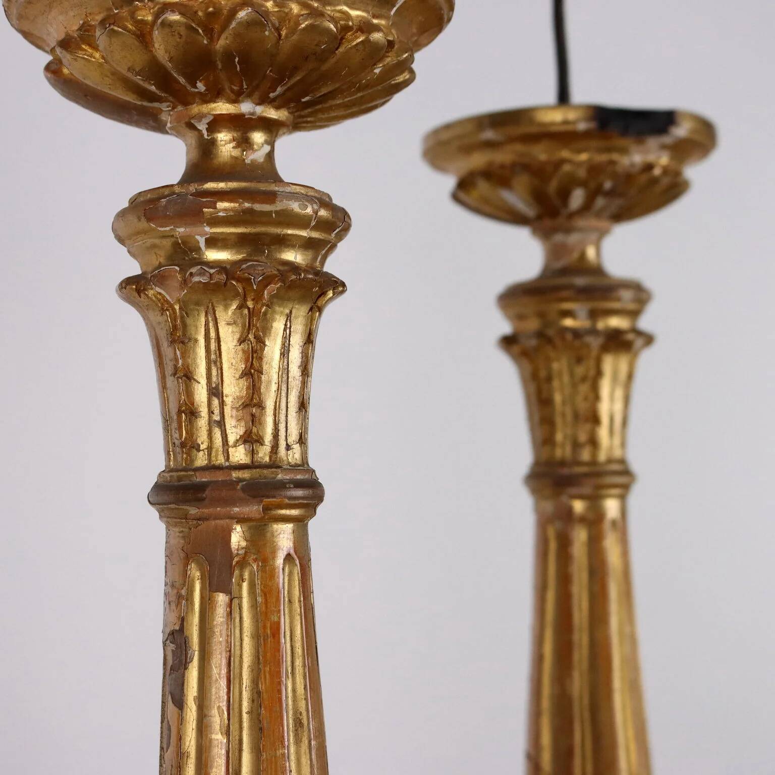 Pair of antique Empire candlesticks in wood, Europe, early 19th century.