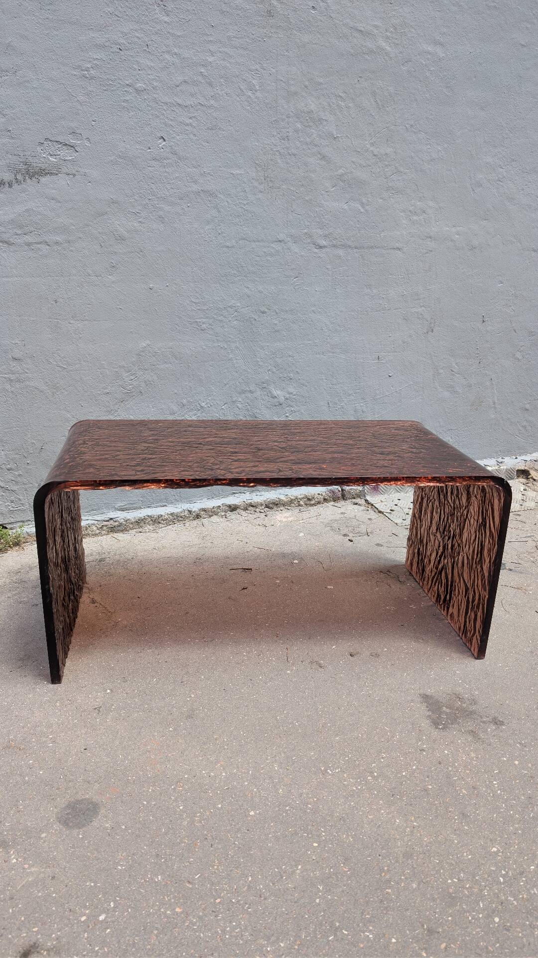 Smoked plexiglass coffee table