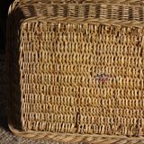 A large vintage rectangular wicker basket