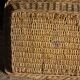 A large vintage rectangular wicker basket