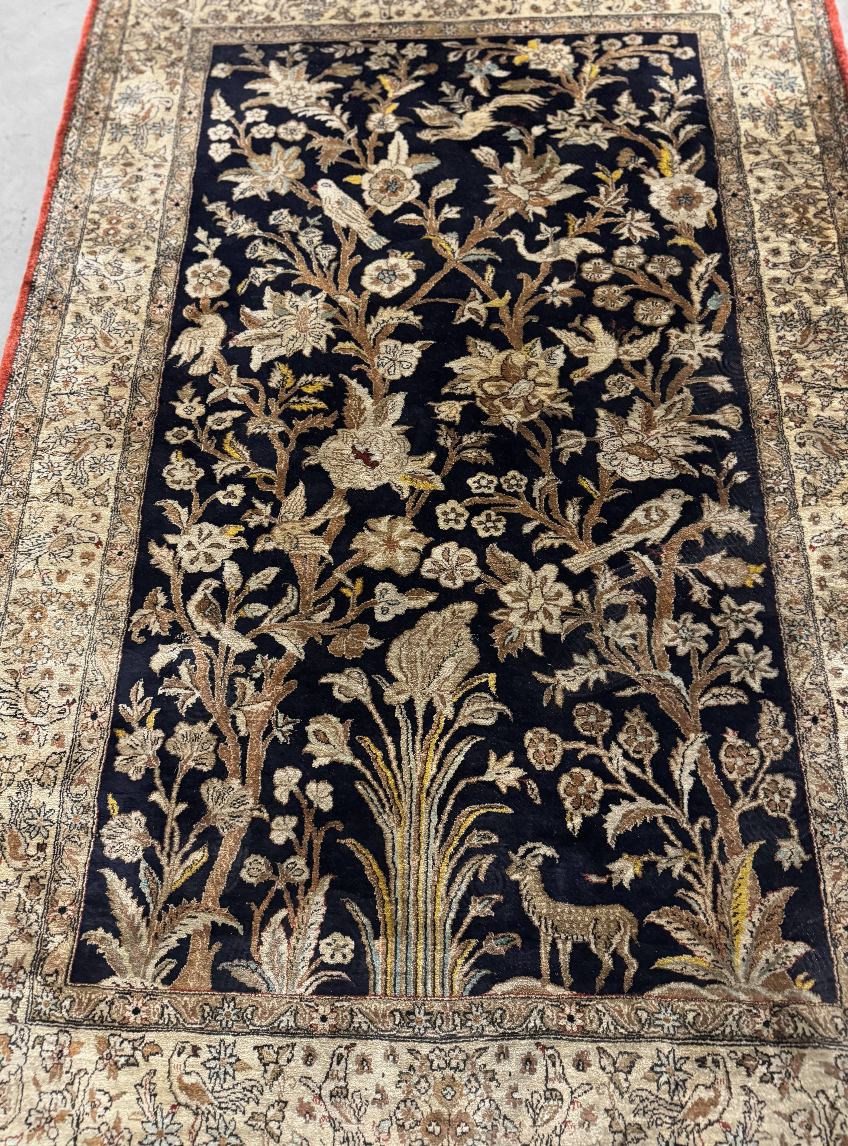 Handmade silk Persian carpet