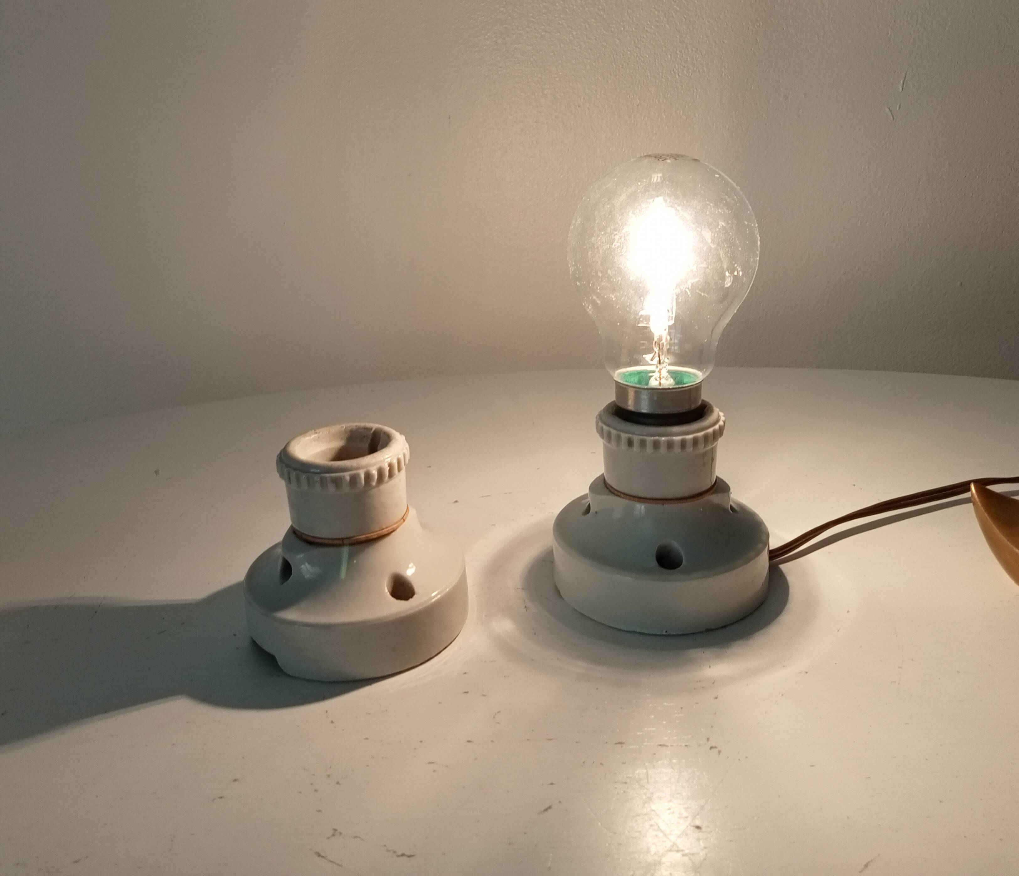 Pair of antique industrial porcelain wall lights