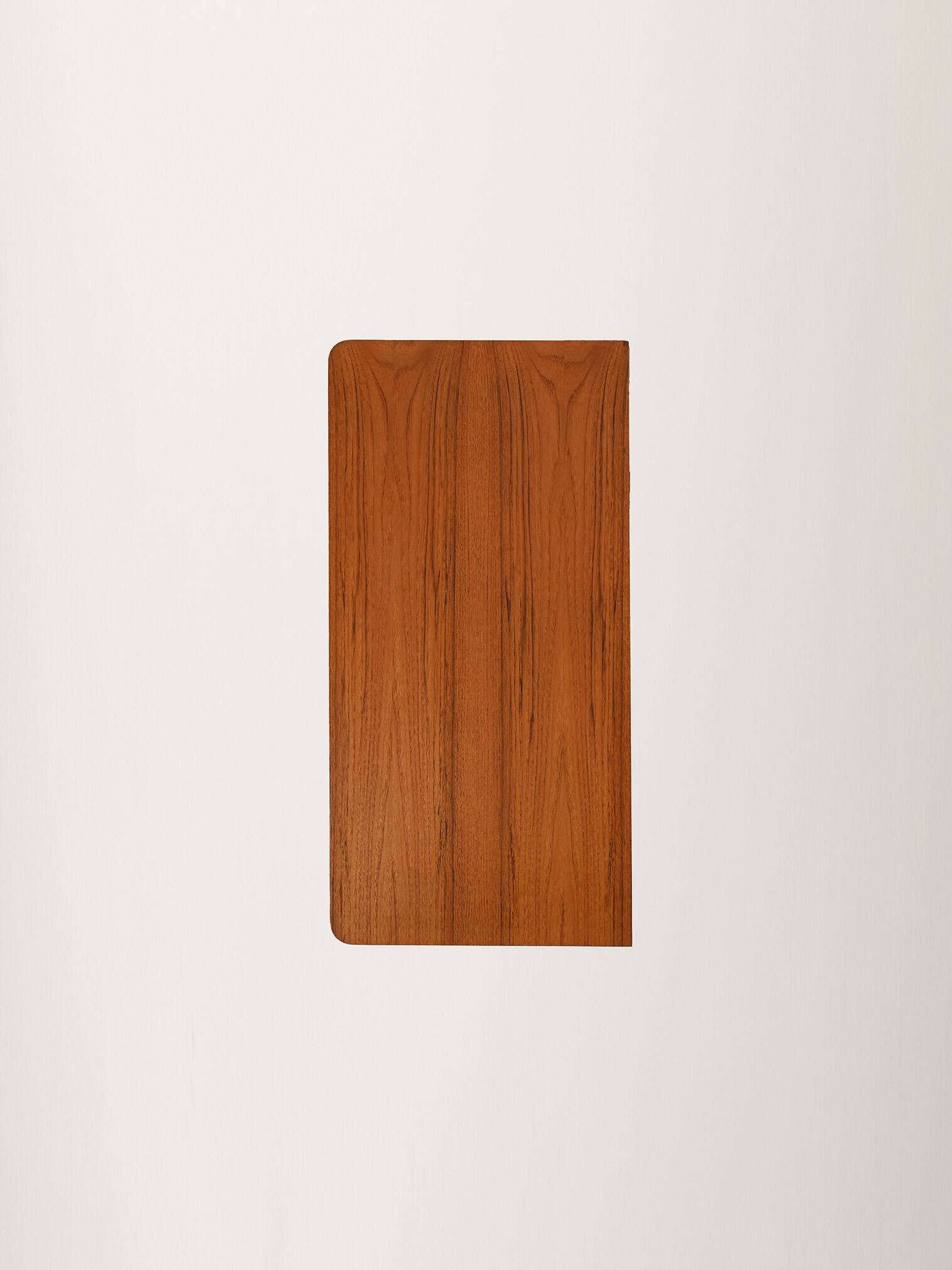 Scandinavian teak chest of drawers with sculpted recessed pulls