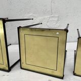 Suite of metal and glass nesting tables.