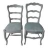 Duo of mismatched country-style chairs re-enchanted in verdigris, upholstered in a mottled fabric
