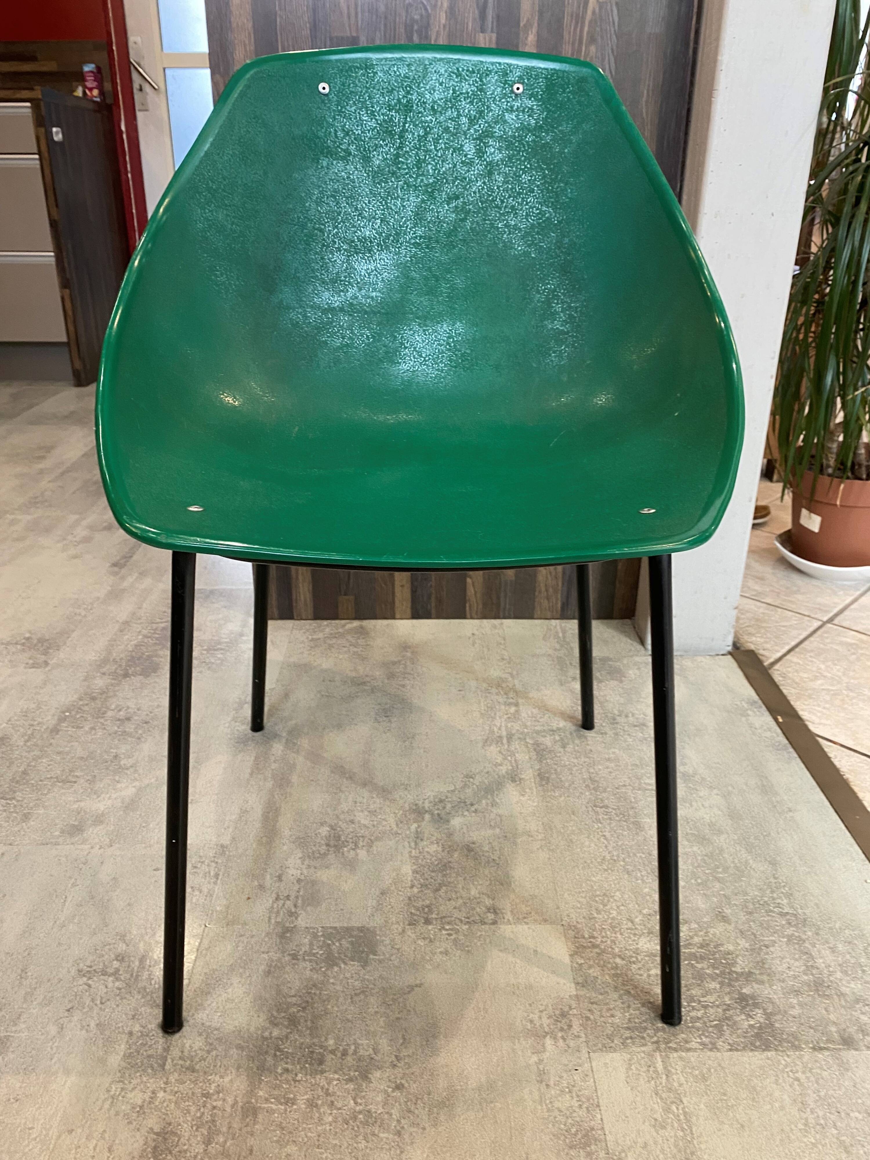 A shell chair by Pierre Guariche for Meurop in vintage green from the 1960s.