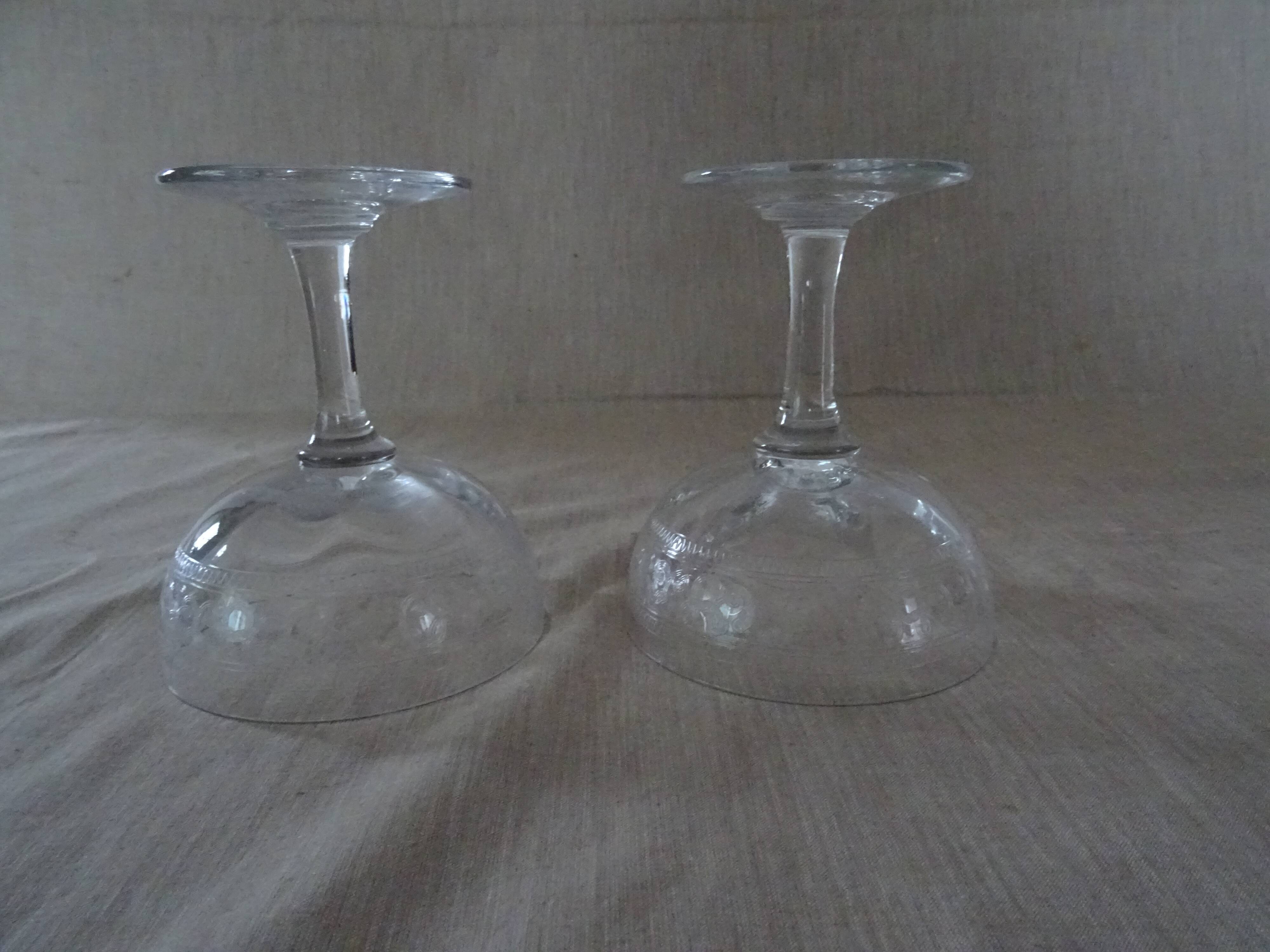 Pair of old crystal champagne glasses wide frieze right foot