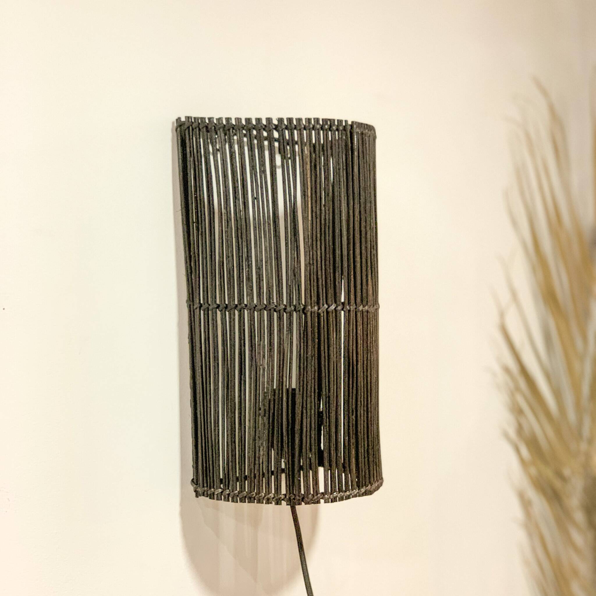 Black rattan wall light