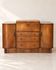 Art Deco walnut bar cabinet with mirrored interior.