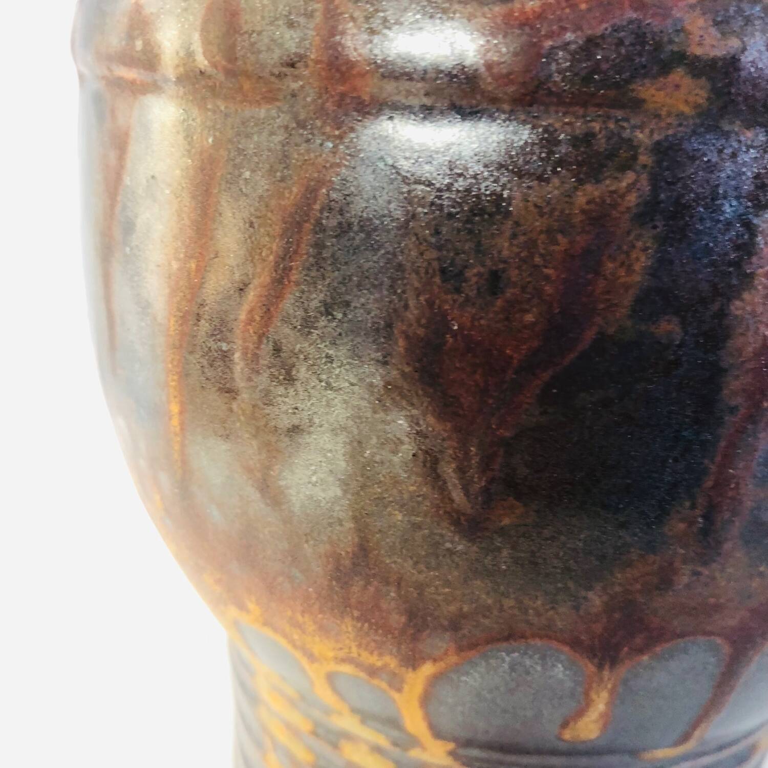 Metallic brown ceramic torso vase
