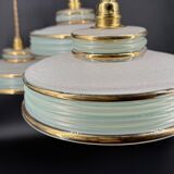 Set of 4 Art Deco pendant lights in frosted water green and gold.