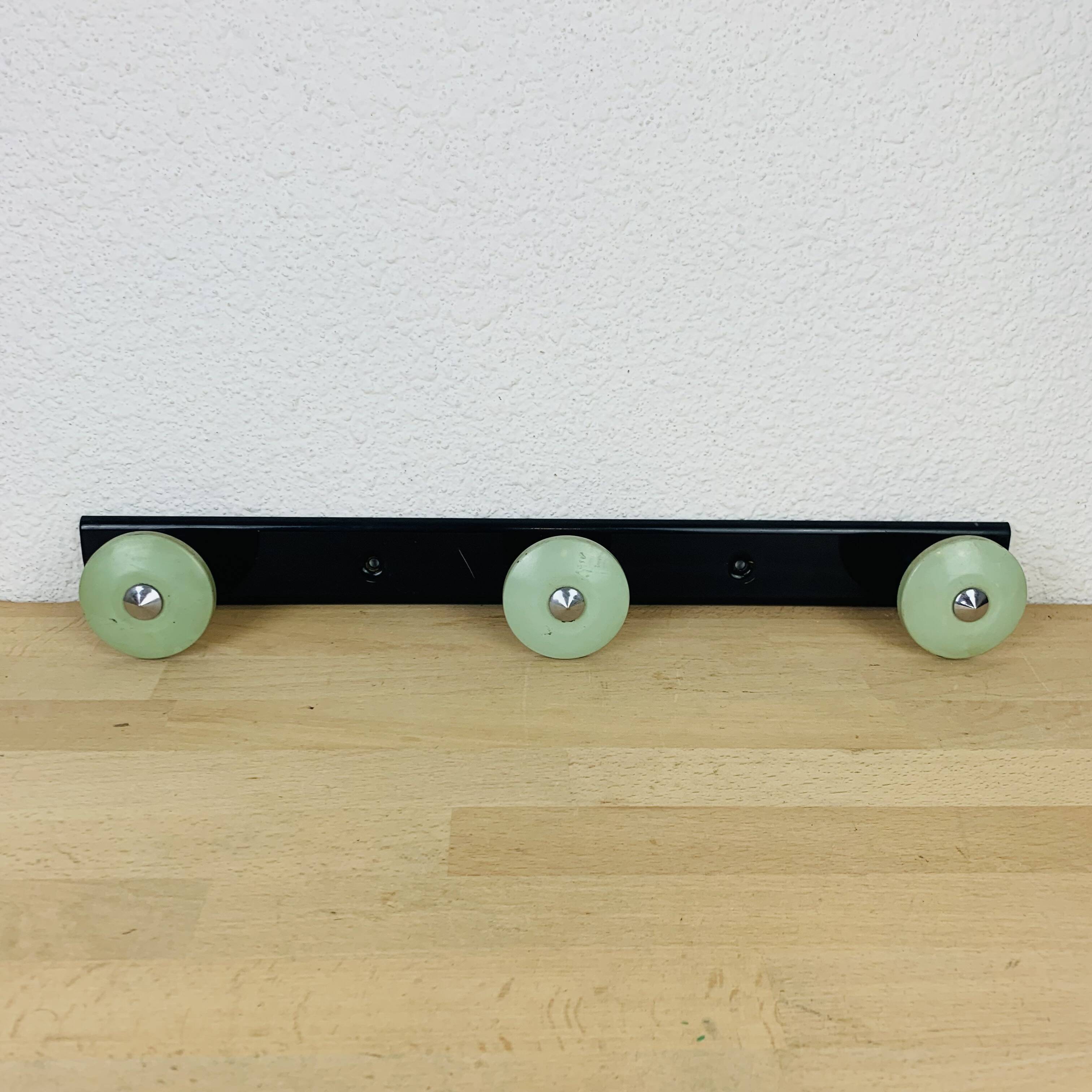 Wall coat rack with 3 hooks from the 1950s