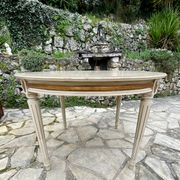 Louis XVI style round table in painted wood