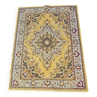 Oriental style rug in ochre tones