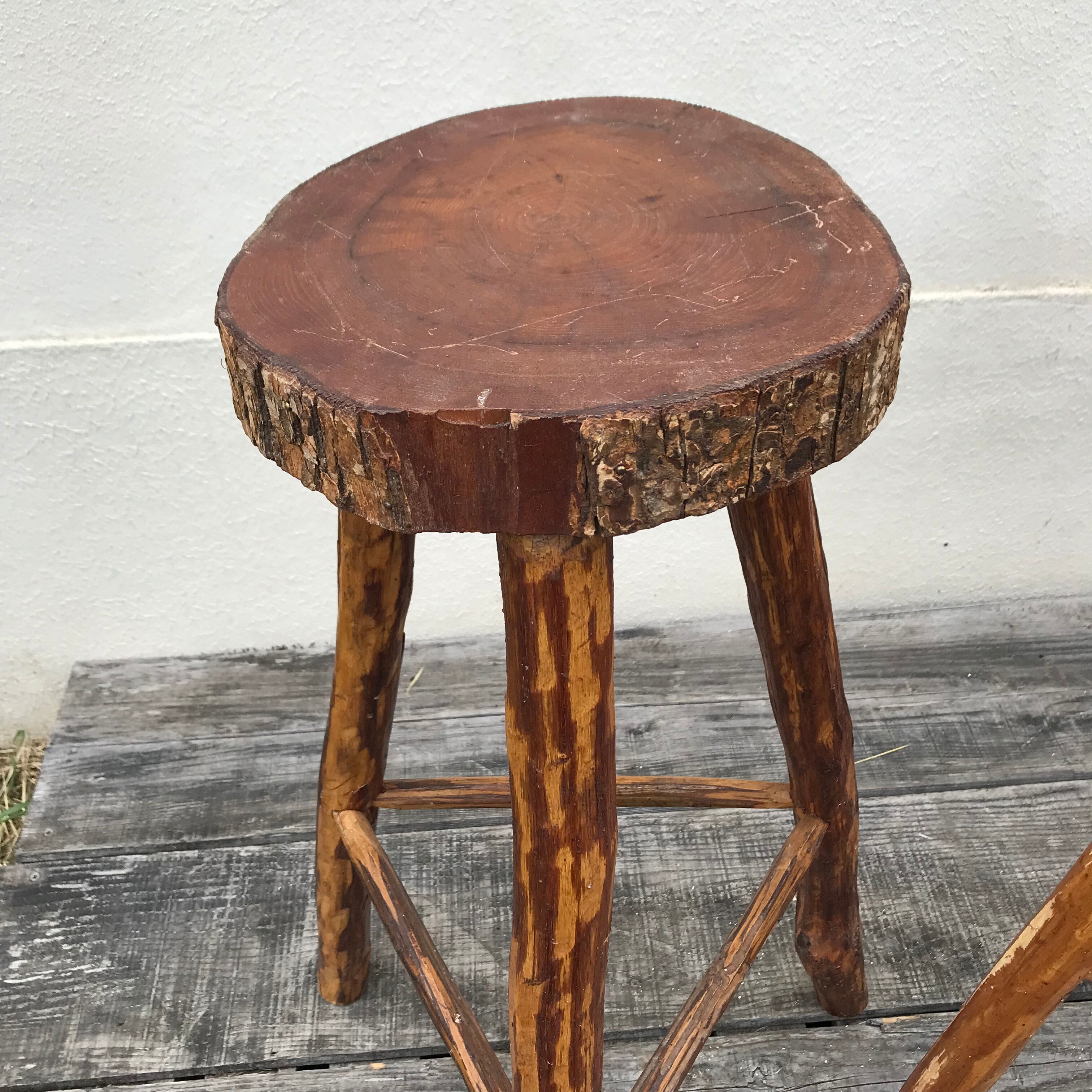 3 bar stools in rough wood