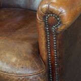 Cognac-colored sheepskin leather club chair