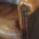 Cognac-colored sheepskin leather club chair