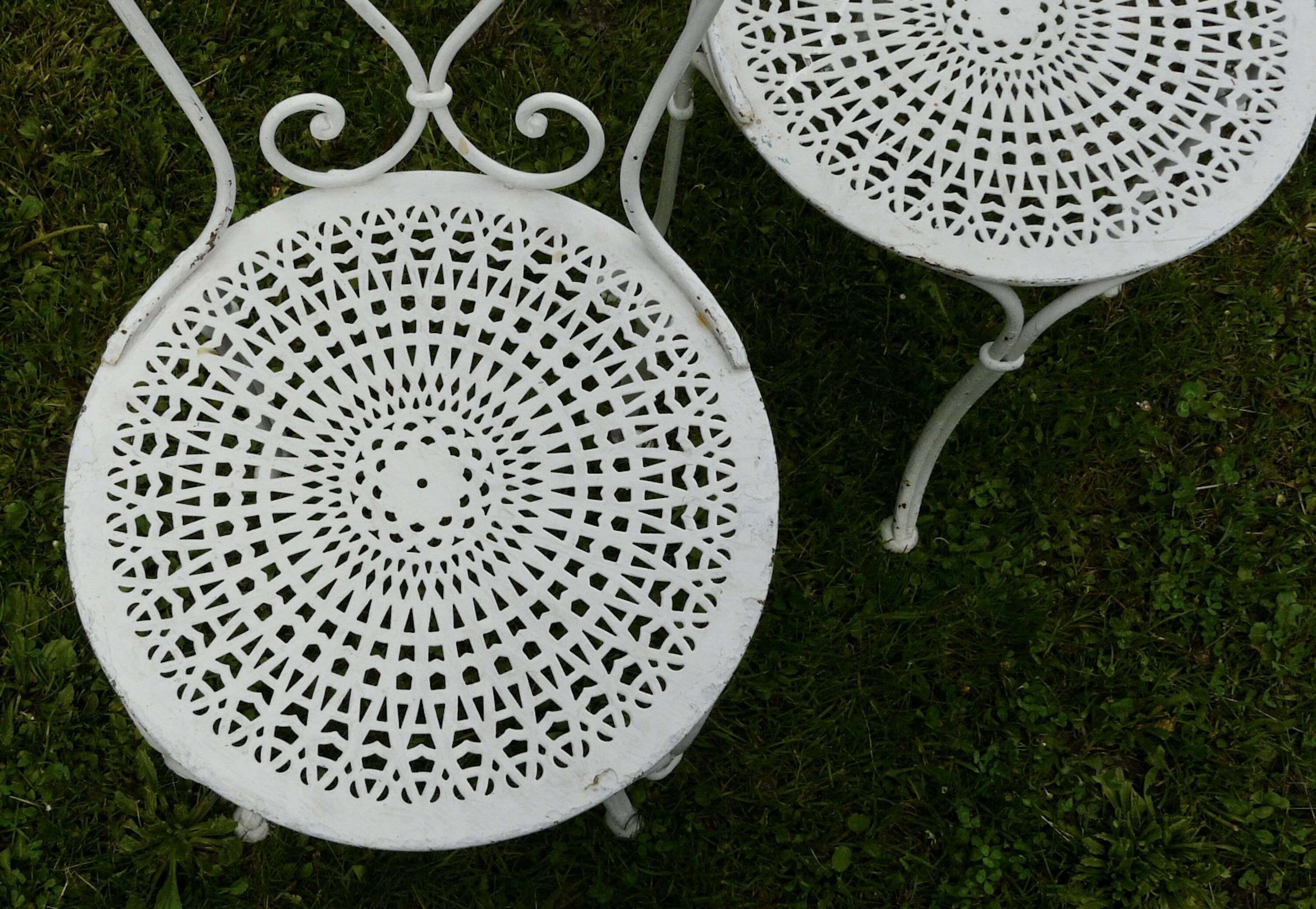 Set of 4 19th century wrought iron garden chairs with heart motif